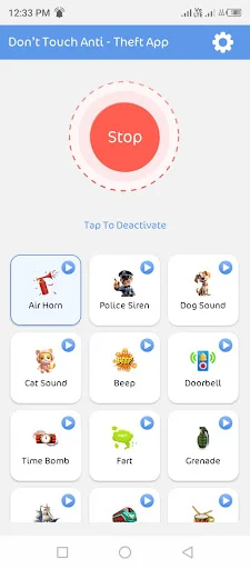 Don't Touch active alarm interface showing red Stop button and grid of selectable motion-triggered alarm sound options