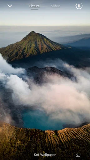 Scenic mountain wallpaper with clouds in ASMR sleep app's picture gallery section for calming visual backgrounds