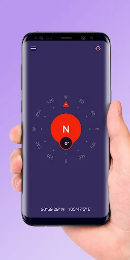 Compass Pro navigation app dark theme displaying directional compass with north indicator and GPS coordinates