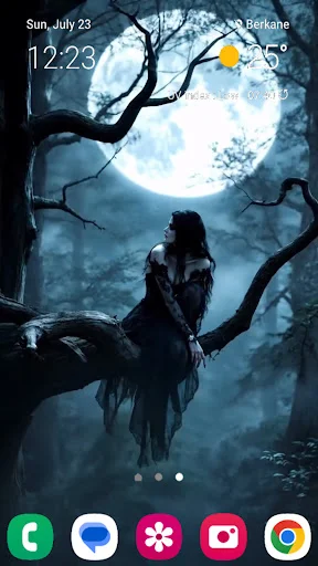 Moonlit horror silhouette wallpaper with full moon and twisted trees for scary phone background