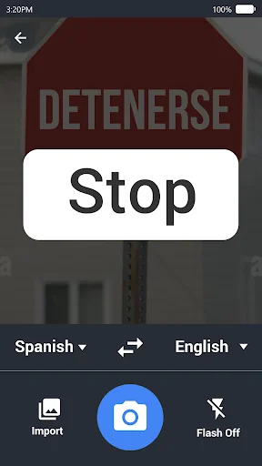 Photo translator app translating Spanish stop sign image to English with camera and import buttons
