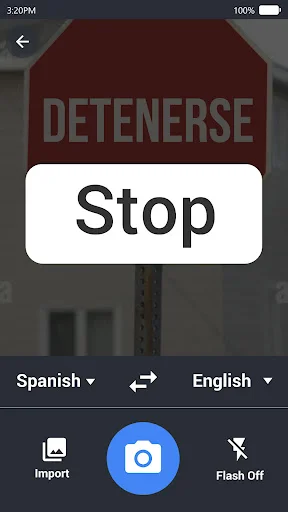 Photo translator app recognizing Spanish stop sign with bilingual text overlay and language swap option